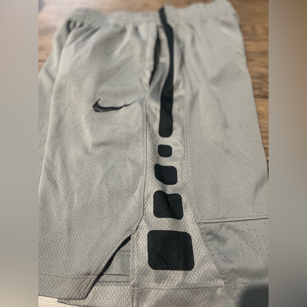 Gently used Gray Nike elite basketball shorts boys size large